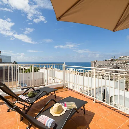 Sunset House Caideros * Моган